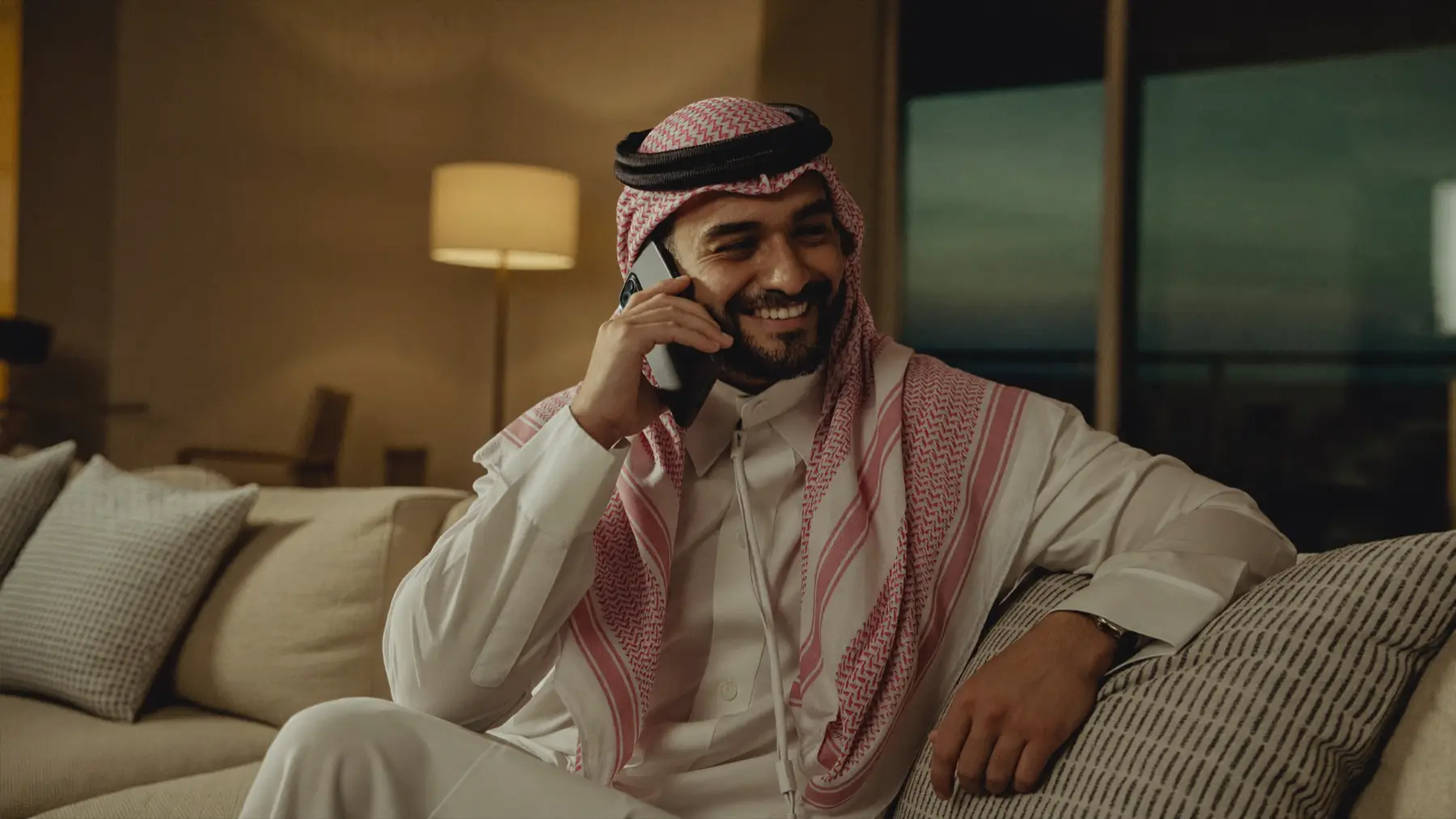 A customer at home answering an appointment reminder call